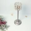 31f54e6d-fc10-4eed-ac50-92504794df5d.jpg Elegant Crystal Votive Candlestick - 9.5 ′′ Tall Silver-Toned Centerpiece