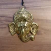 metal-ganesha_11zon.webp Metal Golden Ganesh Face